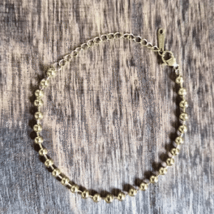 Pulseira de aço em banho dourado